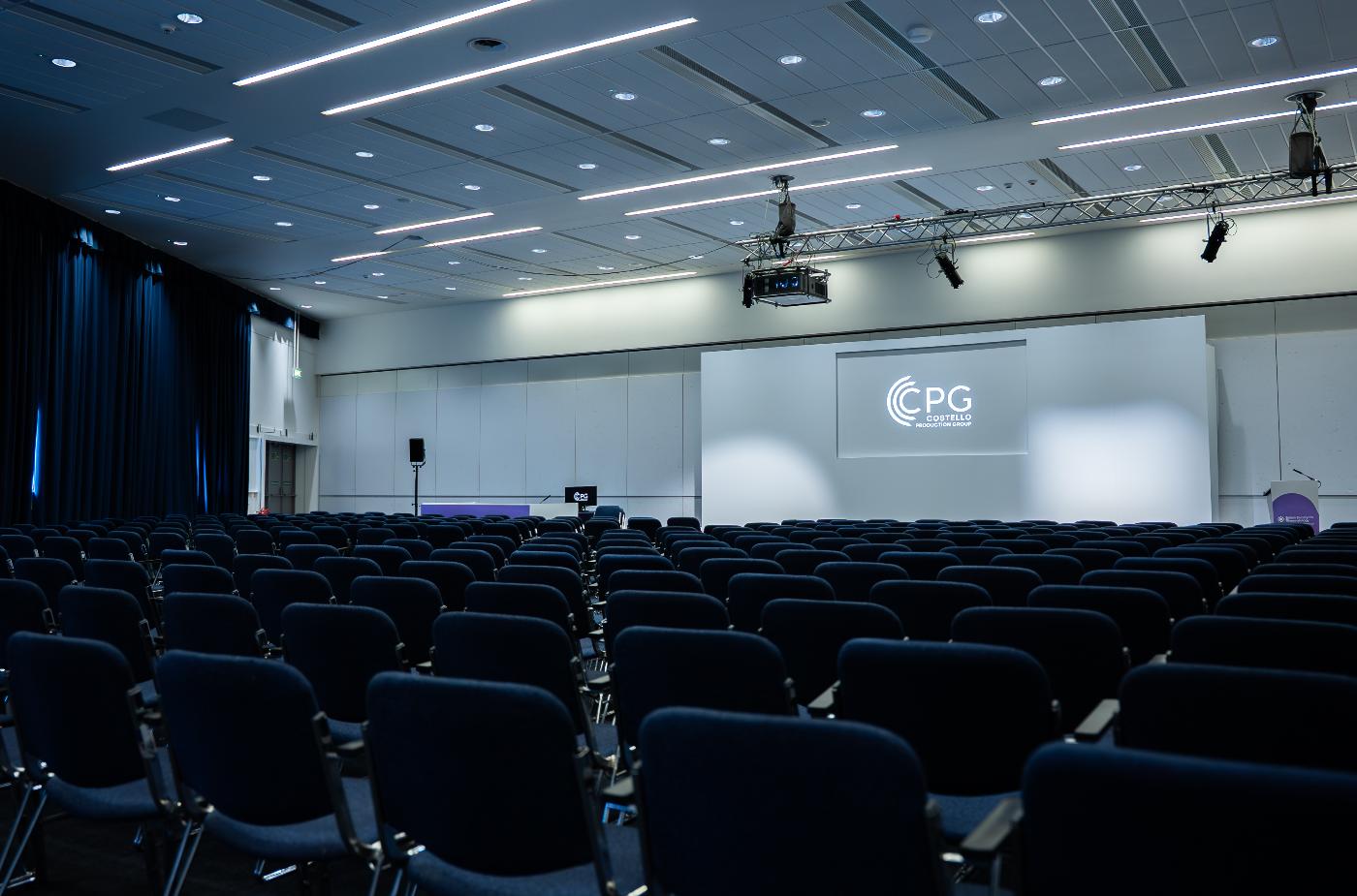 One of the event spaces for the british society of rheumatology event, showing seating and a stage.