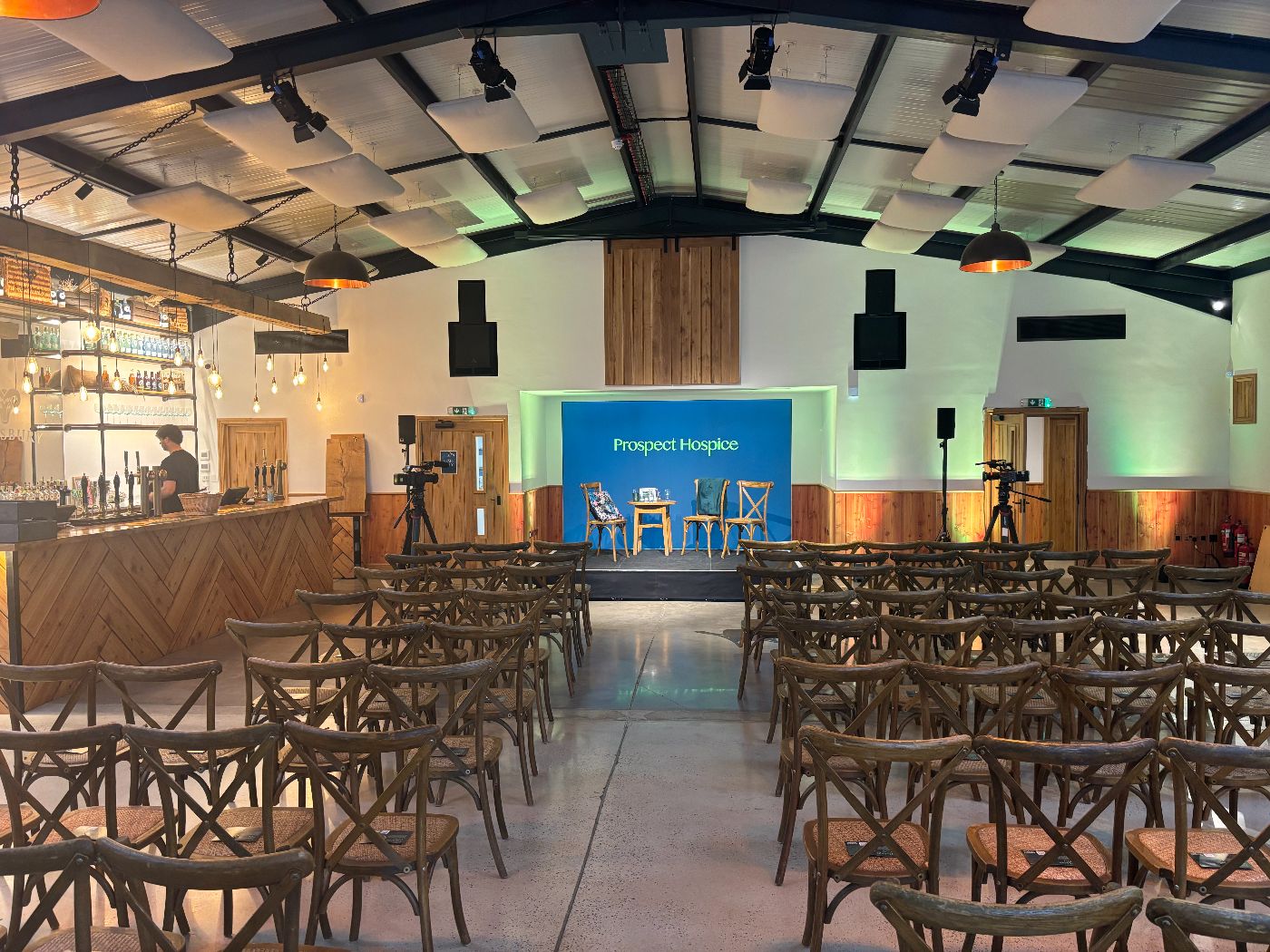 The seating and stage set up for the prospect hospice event.