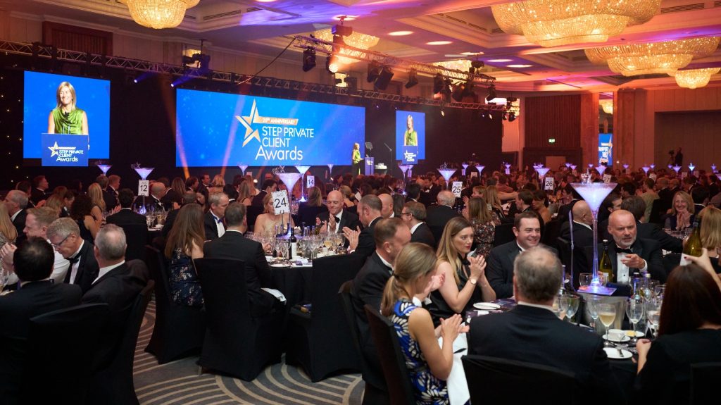 Awards ceremony with guests looking at stage