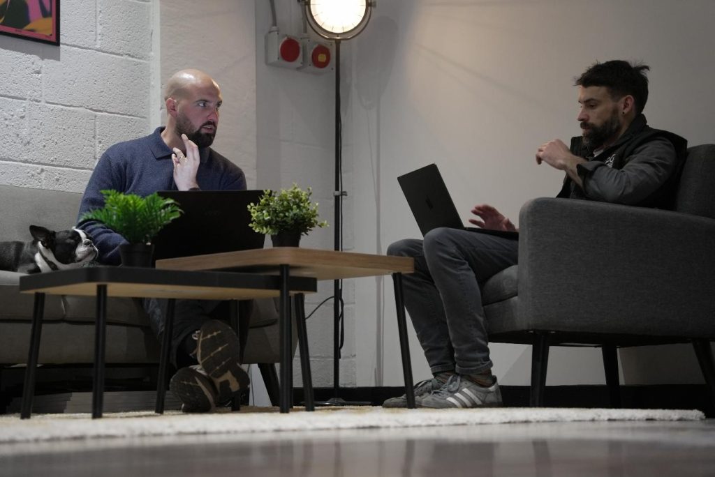 Evan and Aaron from CPG discussing an event